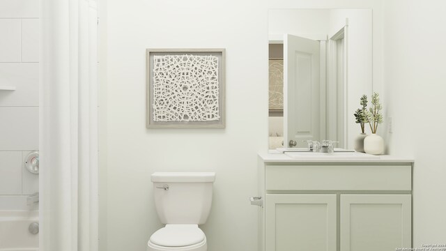 full bath featuring vanity and toilet