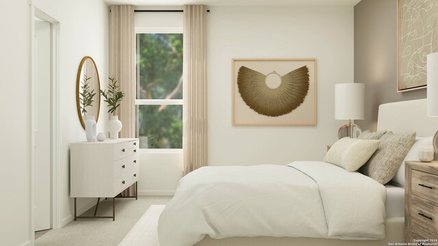 bedroom with carpet floors and baseboards