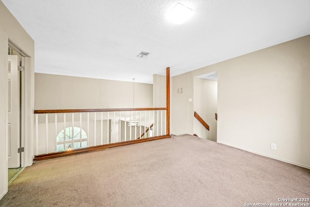 15338 Winter Mist Dr, San Antonio, TX 78247 - carpeted empty room with a textured ceiling and visible vents