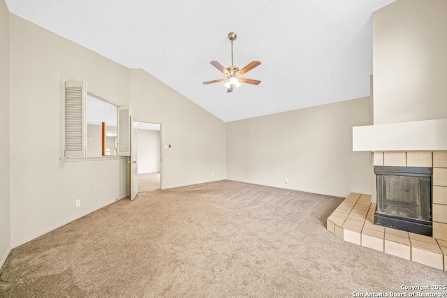15338 Winter Mist Dr, San Antonio, TX 78247 - unfurnished living room with high vaulted ceiling, ceiling fan, a tiled fireplace, and carpet flooring