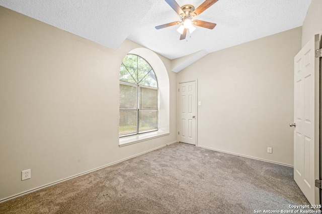 15338 Winter Mist Dr, San Antonio, TX 78247 - carpeted spare room featuring a textured ceiling, a ceiling fan, and lofted ceiling