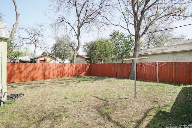 view of yard featuring a fenced backyard