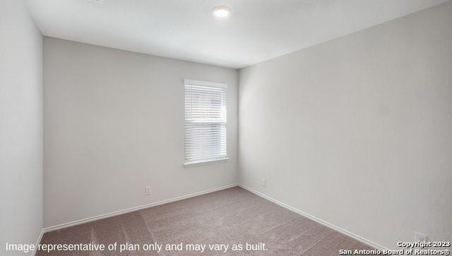1506 Champagne Oak, New Braunfels, TX 78130 - carpeted spare room featuring baseboards
