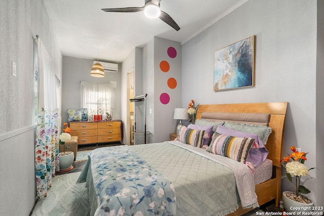 4935 Driskill St, San Antonio, TX 78228 - bedroom featuring a wall mounted AC and ceiling fan