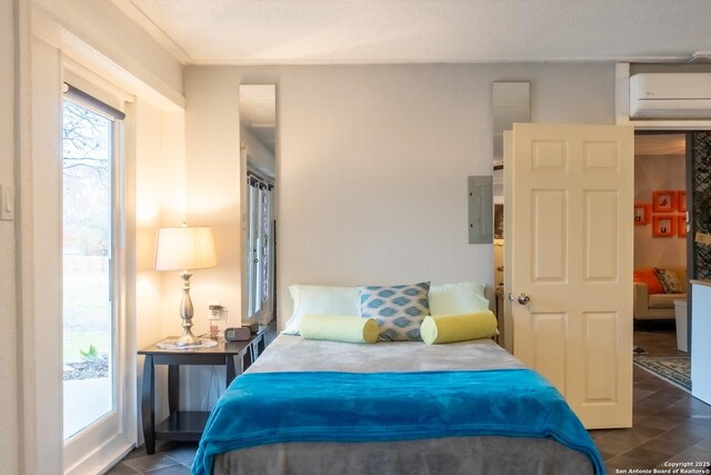 4935 Driskill St, San Antonio, TX 78228 - bedroom featuring dark tile patterned flooring, an AC wall unit, and electric panel