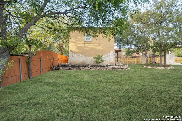 4935 Driskill St, San Antonio, TX 78228 - view of yard featuring a fenced backyard