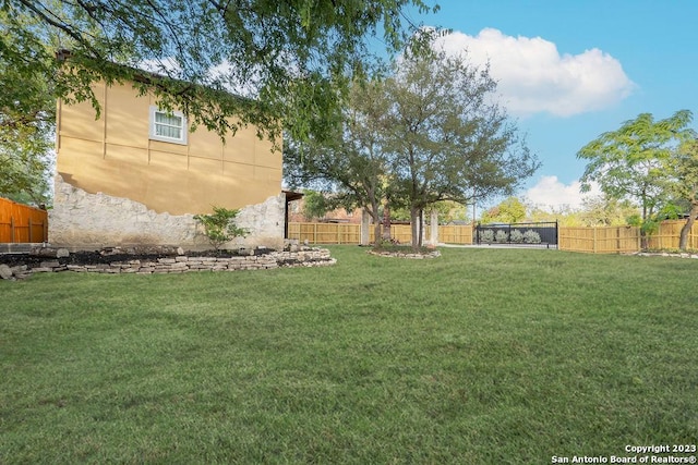 4935 Driskill St, San Antonio, TX 78228 - view of yard featuring a fenced backyard