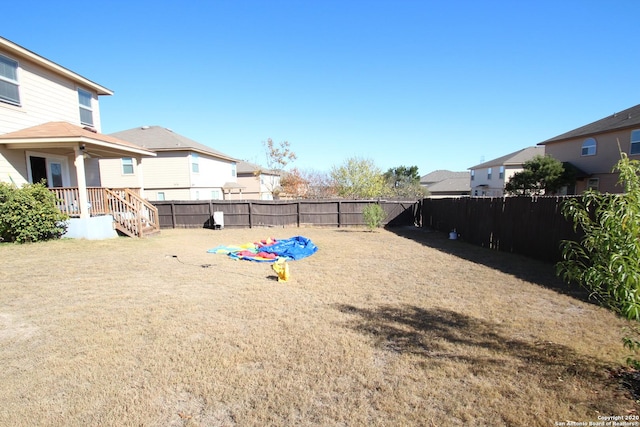 view of yard featuring a fenced backyard