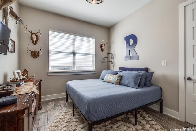 112 Chinkapin, Boerne, TX 78006 - bedroom featuring wood finished floors and baseboards