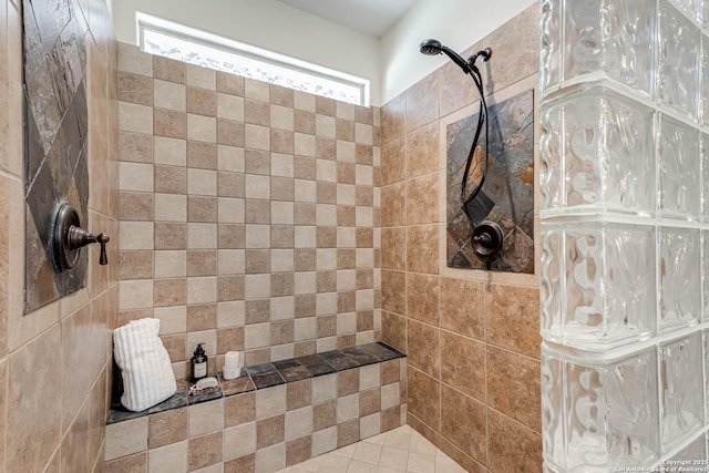 bathroom with tiled shower