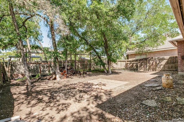 10 Oakwell Farms Pkwy, San Antonio, TX 78218 - view of yard with a patio area and a fenced backyard