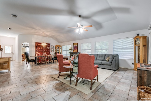 10 Oakwell Farms Pkwy, San Antonio, TX 78218 - living area featuring visible vents, arched walkways, a ceiling fan, light tile patterned flooring, and lofted ceiling