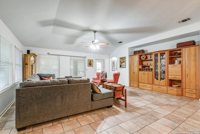 10 Oakwell Farms Pkwy, San Antonio, TX 78218 - living room with visible vents, a ceiling fan, vaulted ceiling, and light tile patterned floors