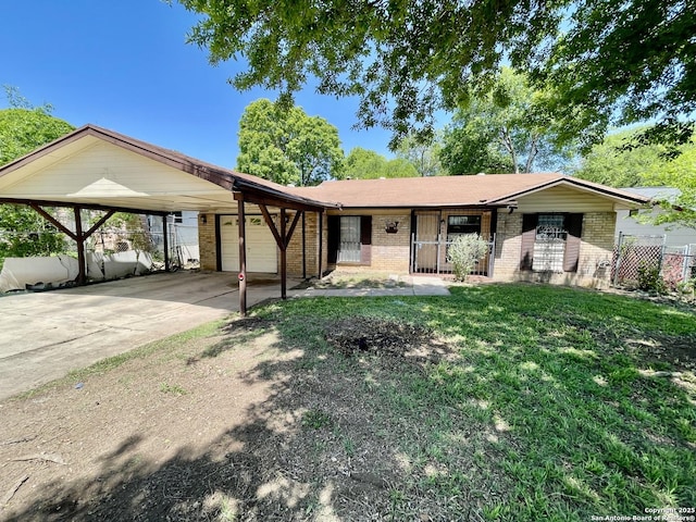 ranch-style house with brick siding, driveway, fence, and an attached garage
