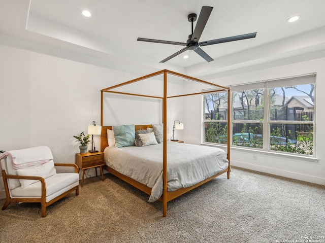 carpeted bedroom featuring recessed lighting, baseboards, and a ceiling fan