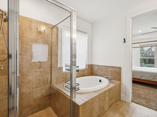 ensuite bathroom featuring ensuite bath, tile patterned floors, a bath, and a stall shower