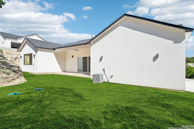 174 Magnolia Mdw, Canyon Lake, TX 78133 - back of property featuring a yard, a patio area, and central AC