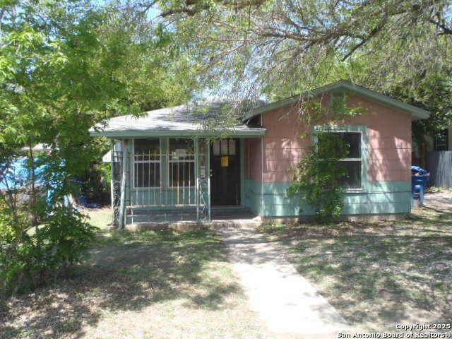 335 Hot Wls, San Antonio, TX 78223 - view of front of house with a sunroom