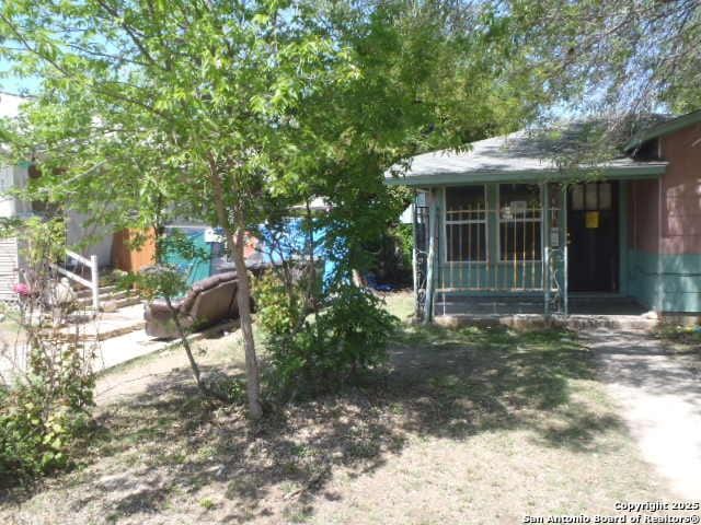 335 Hot Wls, San Antonio, TX 78223 - view of yard with a sunroom