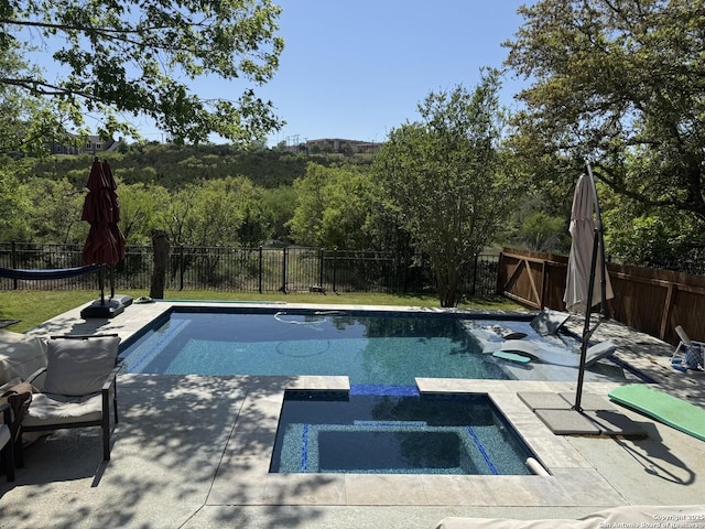 23407 Treemont Park, San Antonio, TX 78261 - view of swimming pool featuring a fenced backyard, a patio, and a pool with connected hot tub