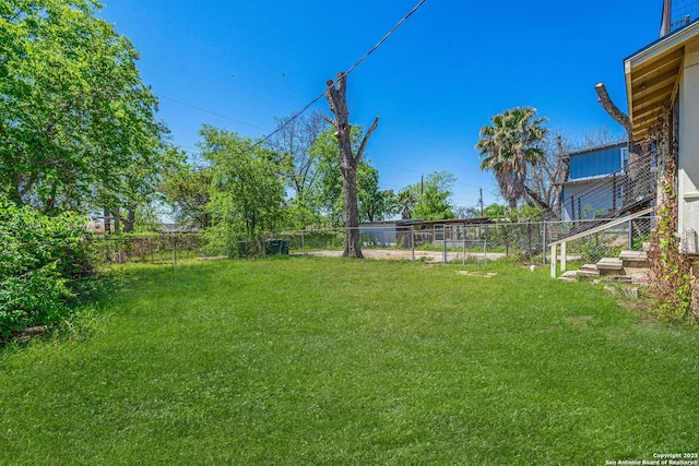 view of yard featuring a fenced backyard