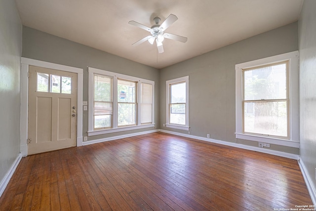 entryway with ceiling fan, baseboards, and hardwood / wood-style flooring