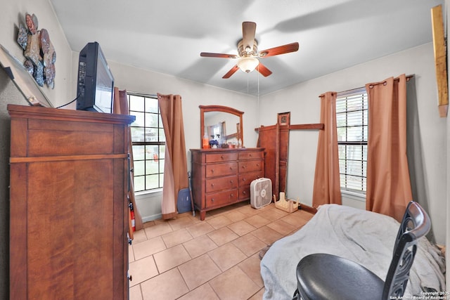 307 Trudell, San Antonio, TX 78213 - bedroom featuring light tile patterned floors, baseboards, and a ceiling fan