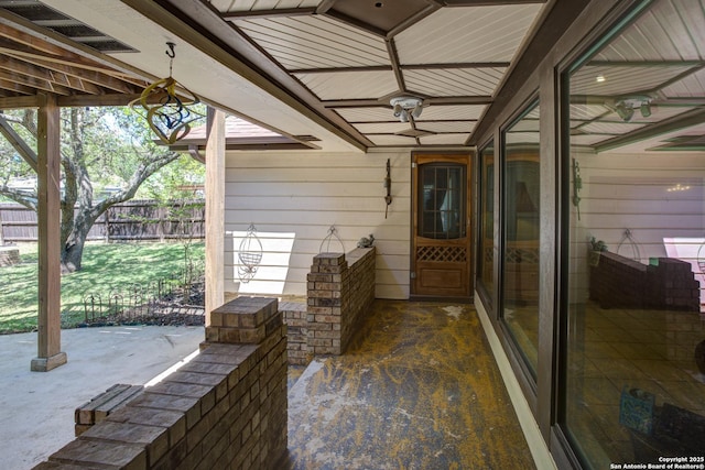 doorway to property with fence