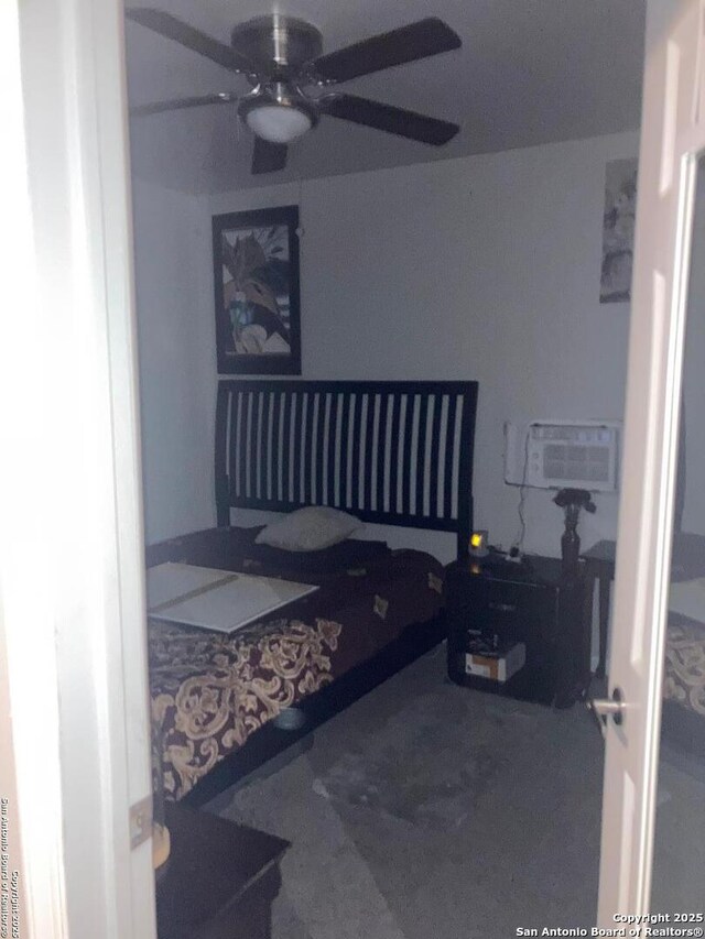 1915 Pasadena St, San Antonio, TX 78201 - bedroom featuring a wall unit AC and a ceiling fan