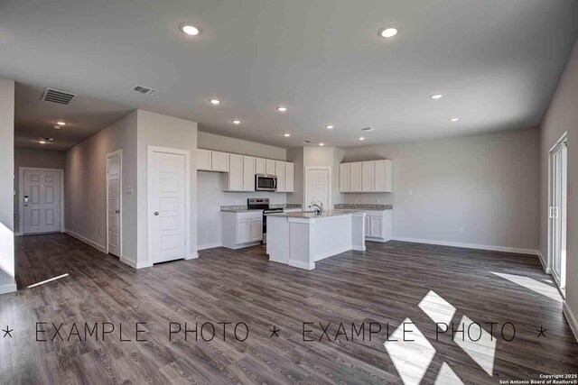 4731 Sahara Vlys, San Antonio, TX 78222 - kitchen featuring recessed lighting, white cabinetry, visible vents, and stainless steel appliances
