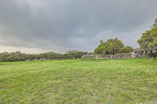 6125 Wegner Rd, New Braunfels, TX 78132 - view of green lawn featuring a rural view