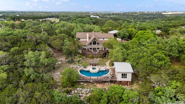 bird's eye view featuring a view of trees