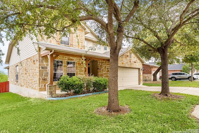 view of front facade featuring an attached garage, a front lawn, stone siding, and concrete driveway