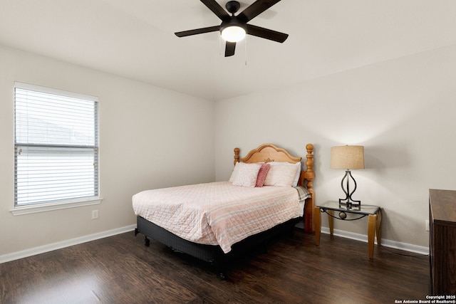 bedroom featuring baseboards, a ceiling fan, and wood finished floors