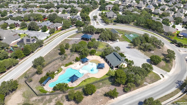 birds eye view of property with a residential view