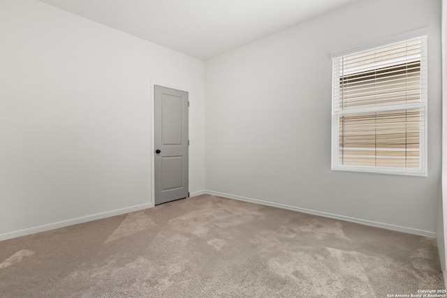 7415 Cheetah Pass, San Antonio, TX 78253 - spare room featuring carpet and baseboards