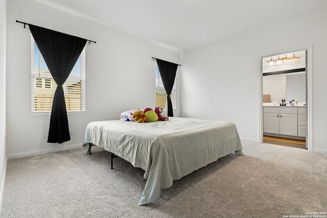 7415 Cheetah Pass, San Antonio, TX 78253 - carpeted bedroom featuring bar, baseboards, and ensuite bath
