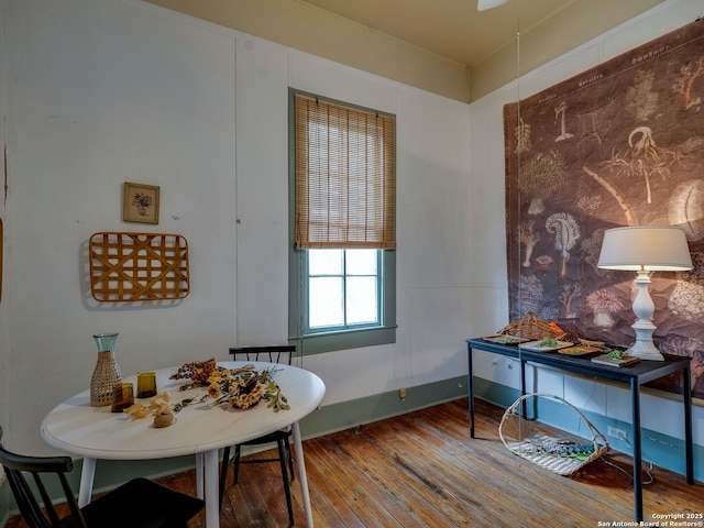 dining area featuring wood-type flooring