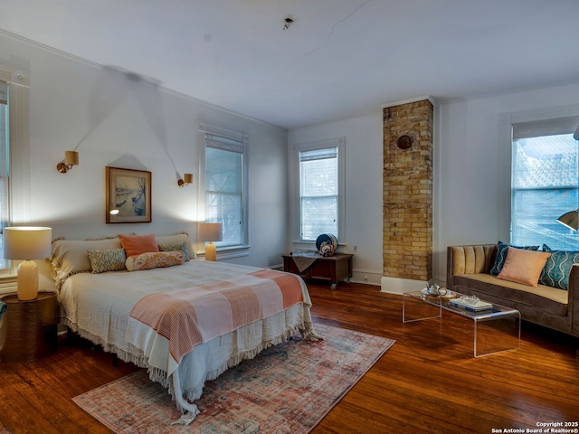bedroom featuring wood finished floors