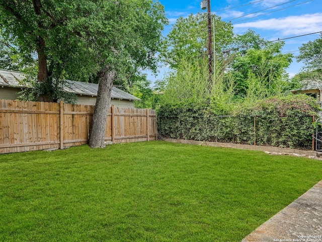 view of yard featuring fence