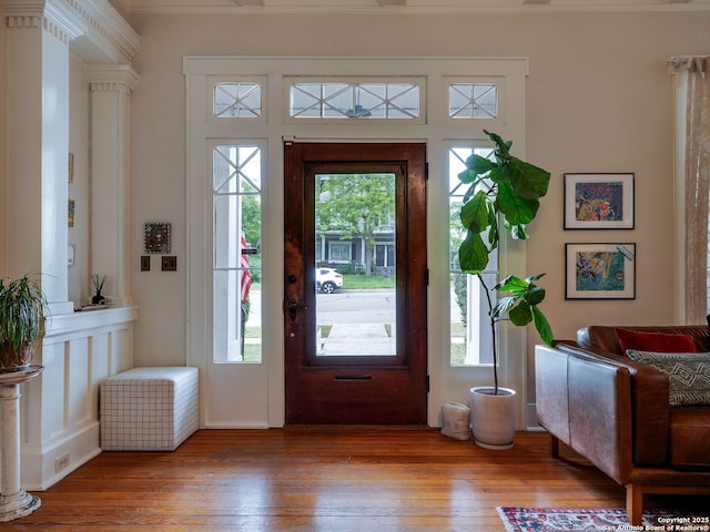 entryway with hardwood / wood-style flooring