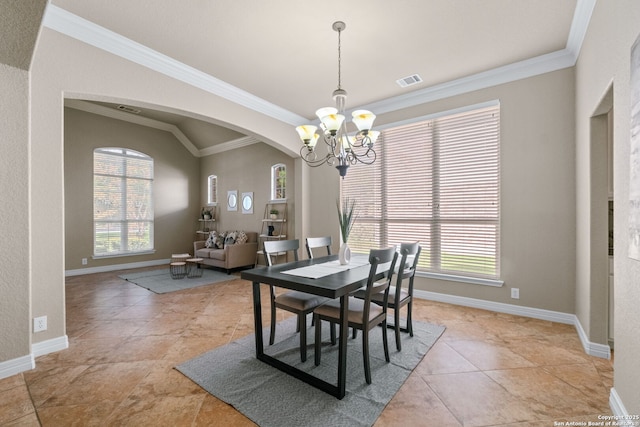 dining space featuring visible vents, baseboards, arched walkways, and a chandelier