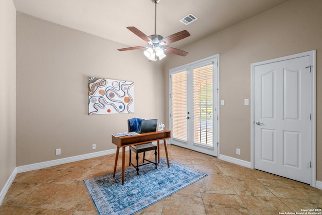 office space featuring visible vents, baseboards, and a ceiling fan