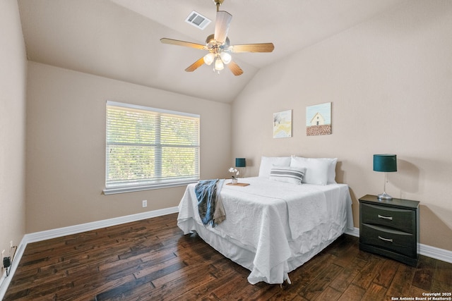 bedroom with baseboards, a ceiling fan, visible vents, lofted ceiling, and wood-type flooring