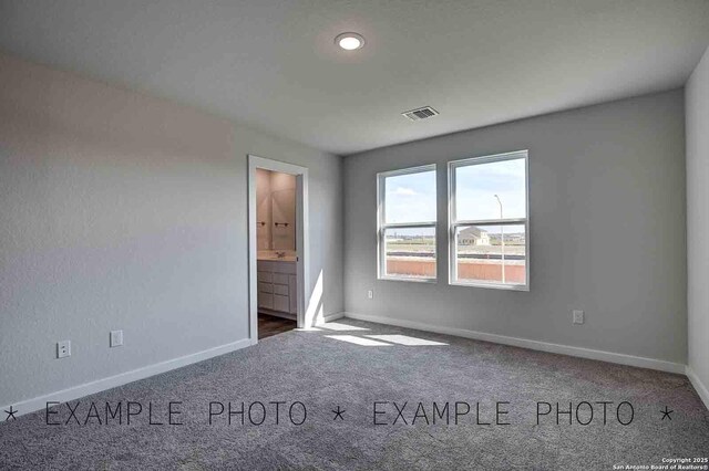 10638 Fairchild Way, San Antonio, TX 78109 - unfurnished bedroom with visible vents, baseboards, ensuite bathroom, and carpet