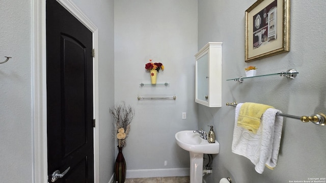 bathroom with baseboards