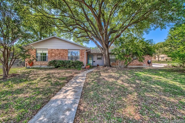 6022 Clearbrook, San Antonio, TX 78238 - ranch-style house featuring a front yard and brick siding