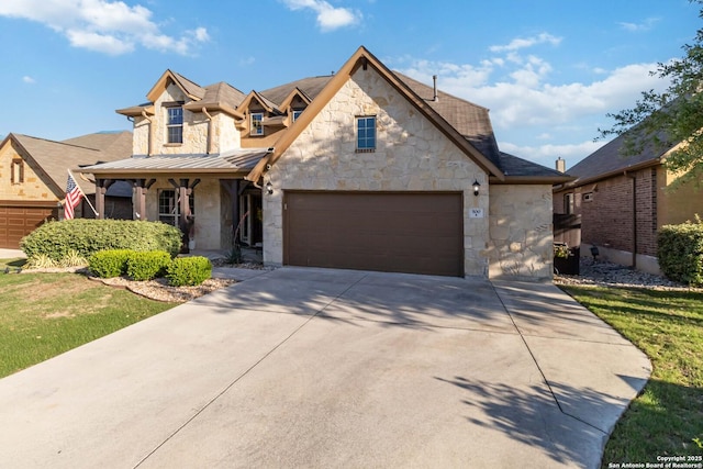 500 Pecan Farms, New Braunfels, TX 78130 - traditional home with stone siding, a garage, driveway, and covered porch