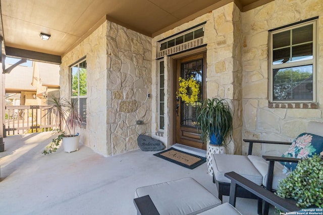 500 Pecan Farms, New Braunfels, TX 78130 - view of exterior entry featuring a porch and stone siding