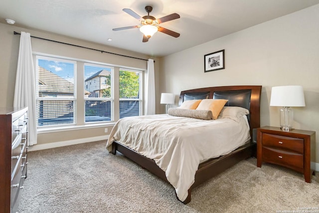 500 Pecan Farms, New Braunfels, TX 78130 - bedroom featuring baseboards, a ceiling fan, and carpet flooring